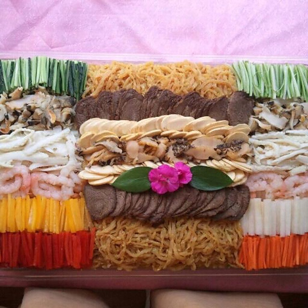 Ceremonial platter arranged in nine sections