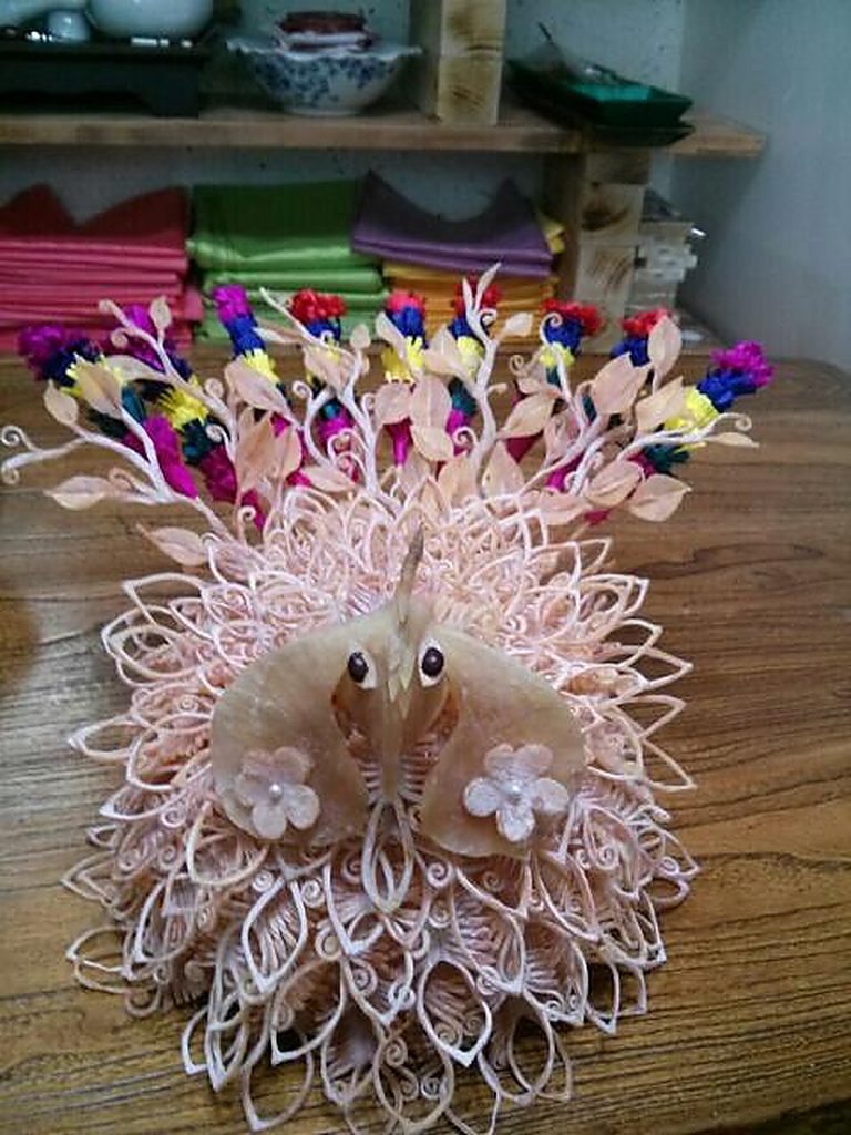 Detailed squid phoenix craft for a wedding table